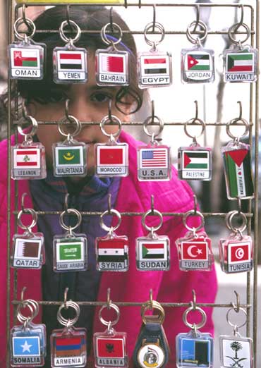 girl looking at key chains for sale
