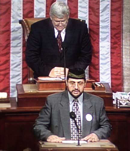 Imam Yahya Hindi gives the opening prayer in the House of Representatives
