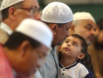 a boy looking up to his father
